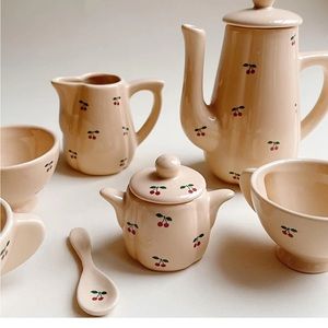 Konges slojd childrens tea set in cherry. Porcelain.